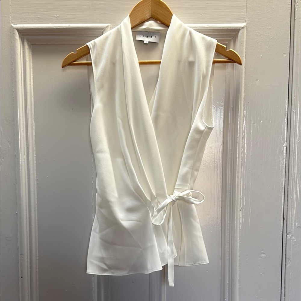 Like new Libby Elegant White Sleeveless Wrap Top
